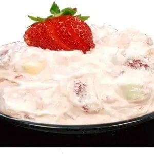 Bowl of creamy strawberry fruit salad