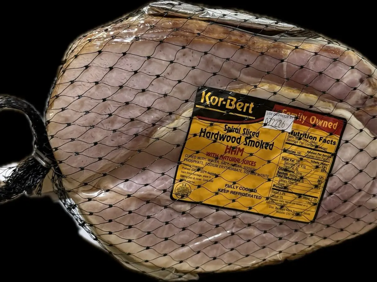 Net-wrapped hardwood smoked spiral ham