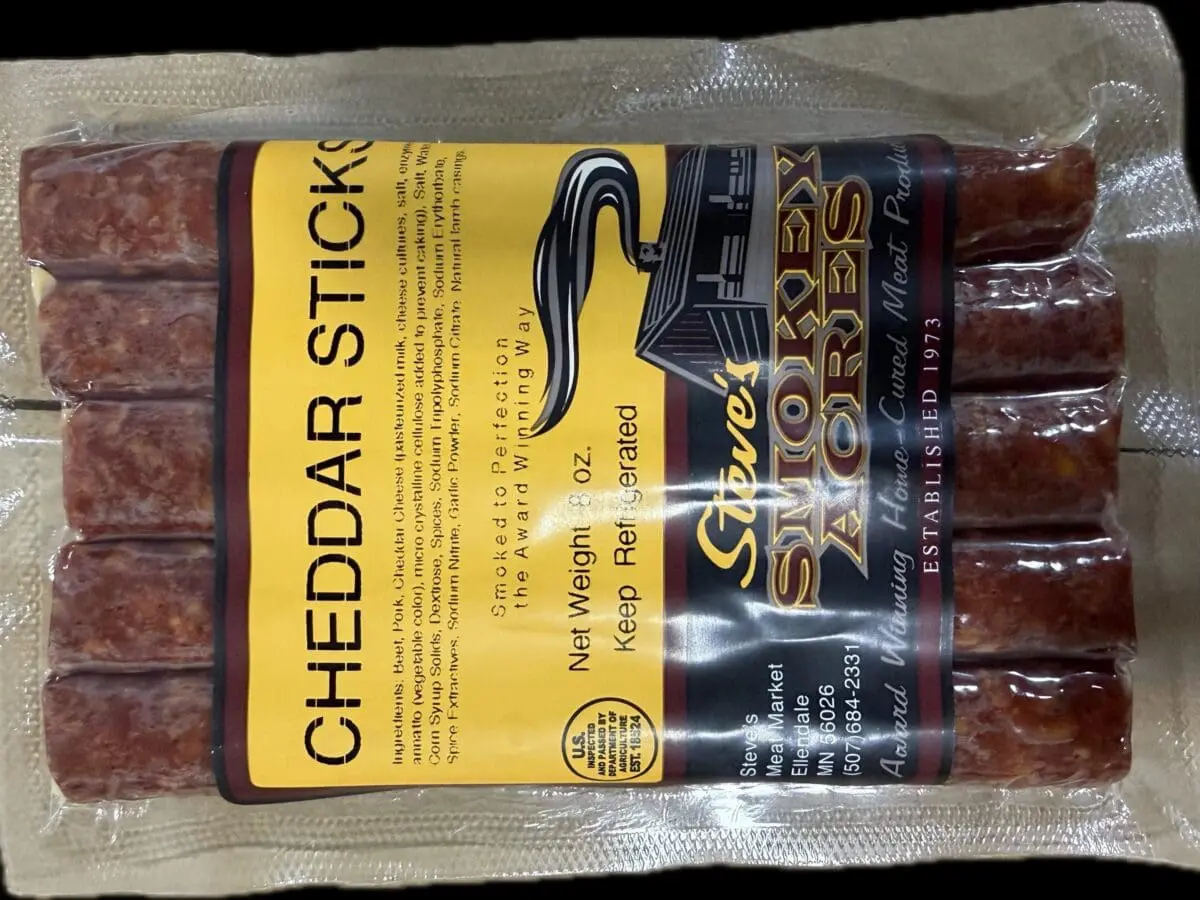 Vacuum-sealed cheddar snack sticks in package