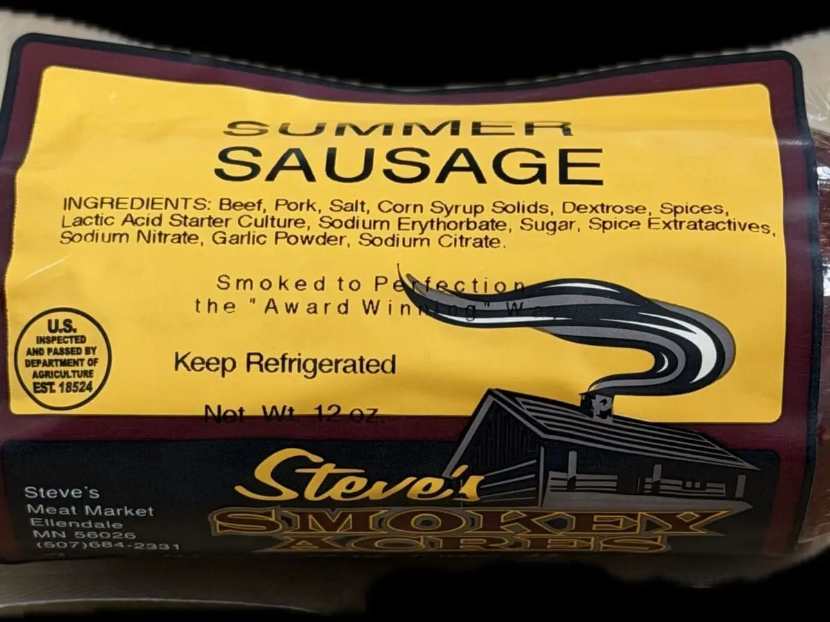 Vacuum-sealed summer sausage with yellow label