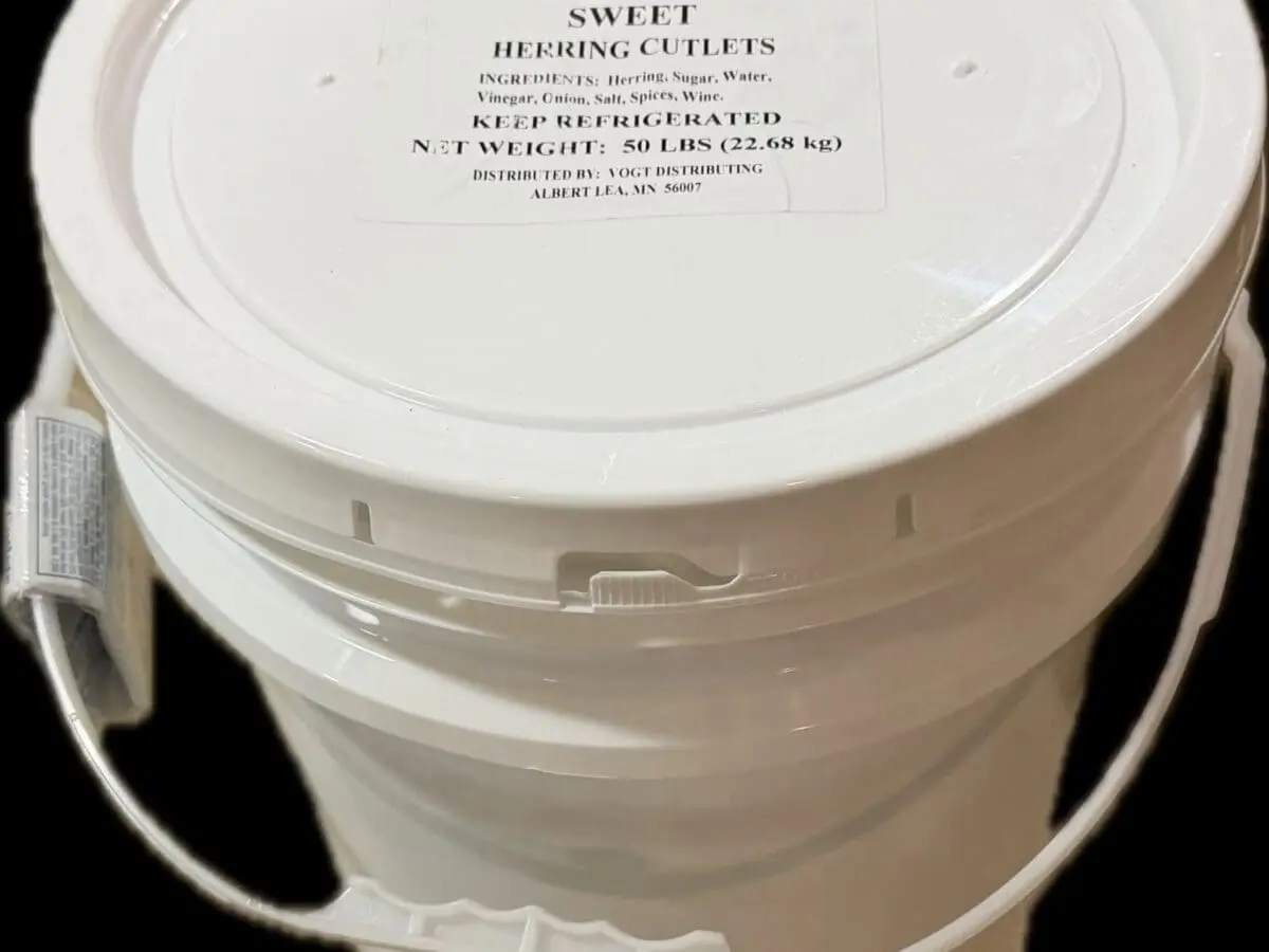 White plastic bucket labeled sweet herring cutlets
