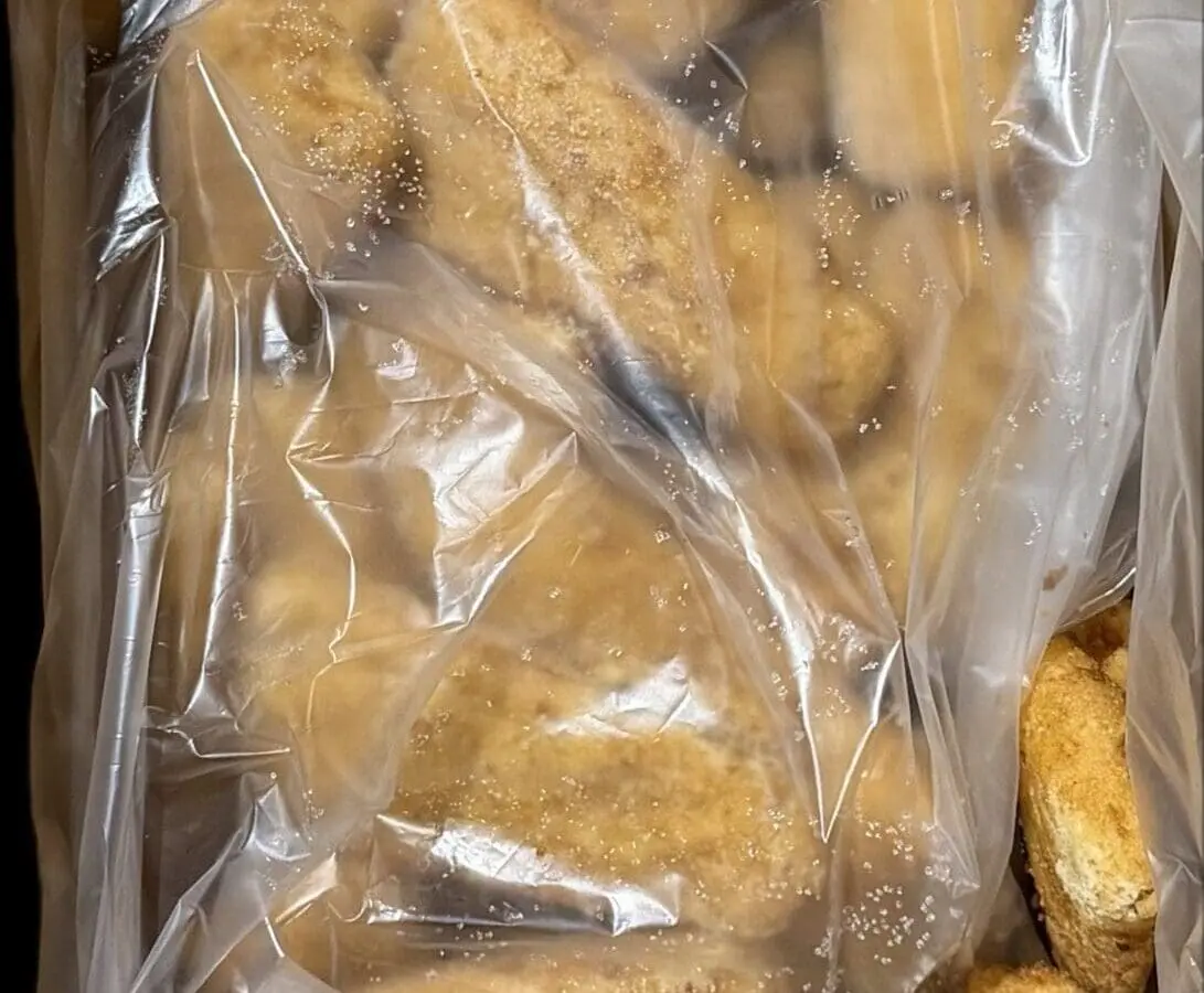 Box of sugar-coated biscuits wrapped in plastic