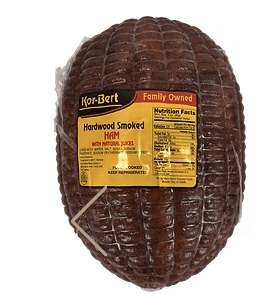 Whole smoked ham in netting with label