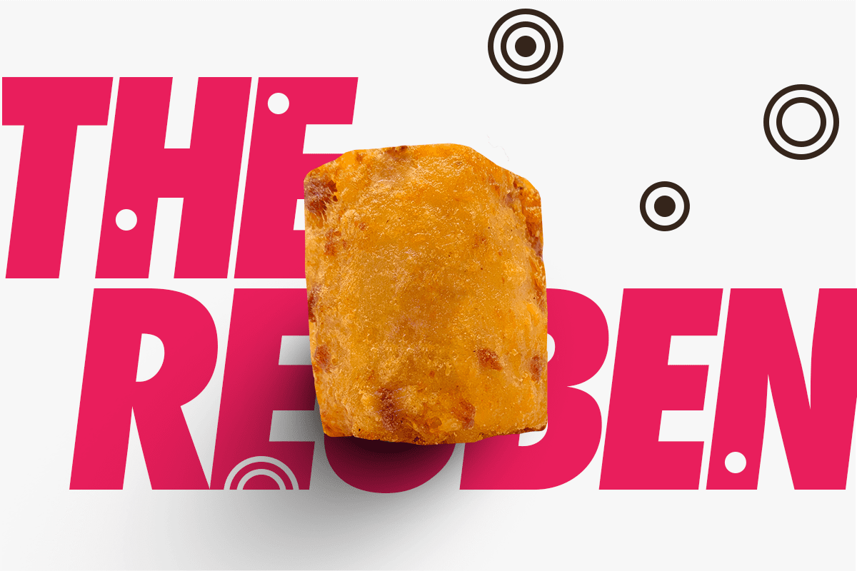 Crispy Reuben sandwich bite on graphic text