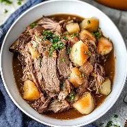 Beef pot roast with potatoes and gravy