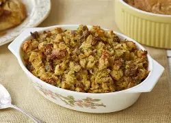 Baked stuffing in a floral serving dish