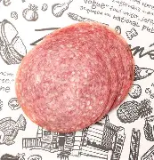 Three salami slices on illustrated paper